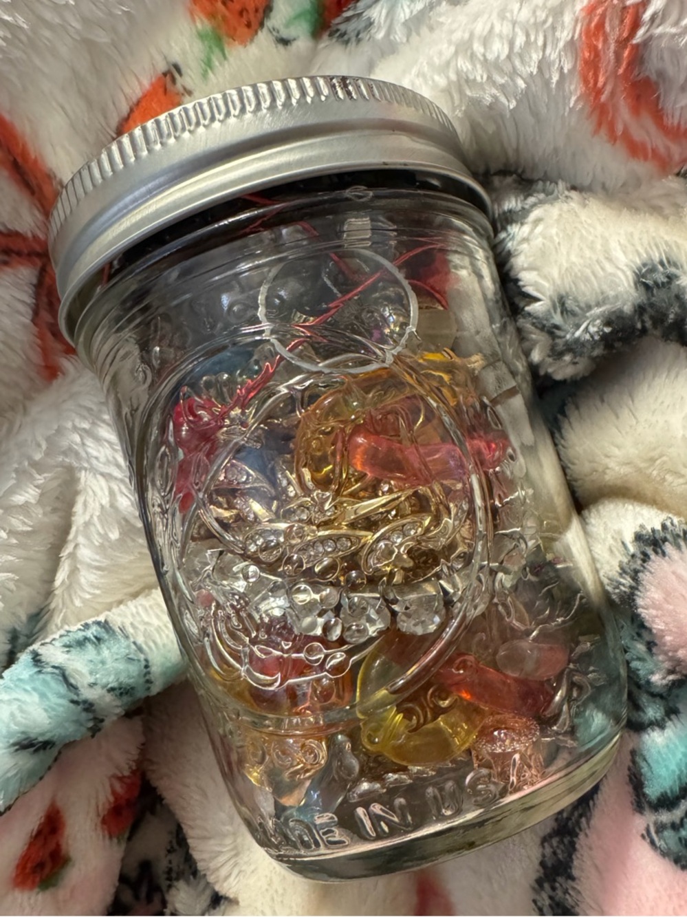 Small Jewelry Jar filled with random jewelry and charms